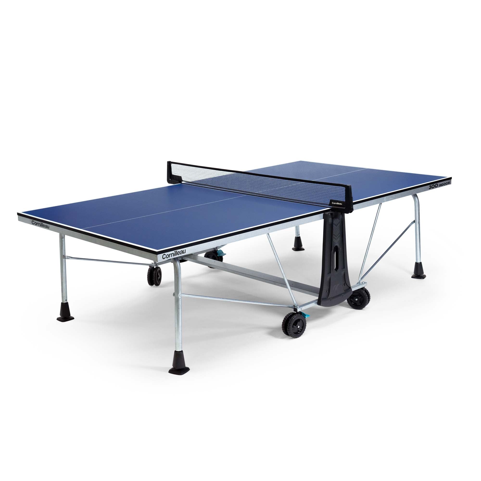 Blue table tennis table with black net on a white background